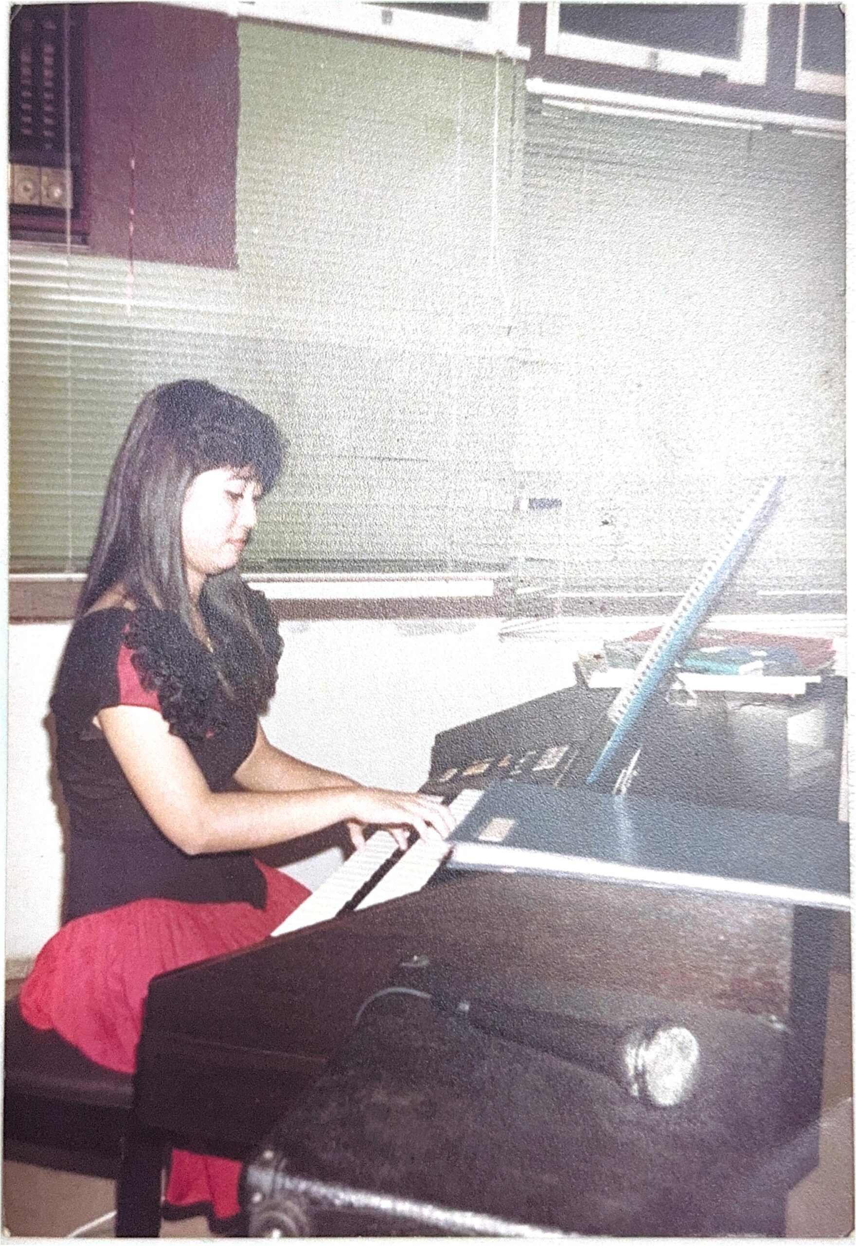 An early piano lesson from the Helen's Music Centre archives