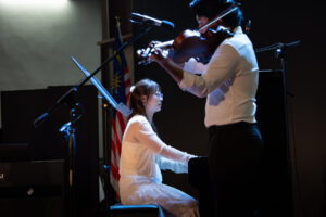 Violin performance at Helen's Music Centre